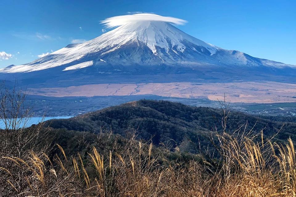 This picture taken on December 9, 2021 shows Mount Fuji pictured from Mount Ishiwari near Oshino, Yamanashi prefecture.