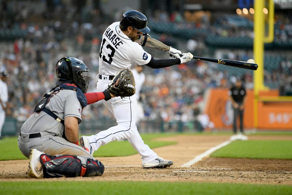 Tigers catcher Eric Haase hits an RBI double off Guardians pitcher Aaron Civale in the fourth inning on Wednesday, Aug. 10, 2022, at Comerica Park.