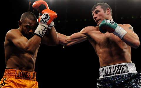 Jones Jr shields himself from a Calzaghe punch - Credit: Getty Images