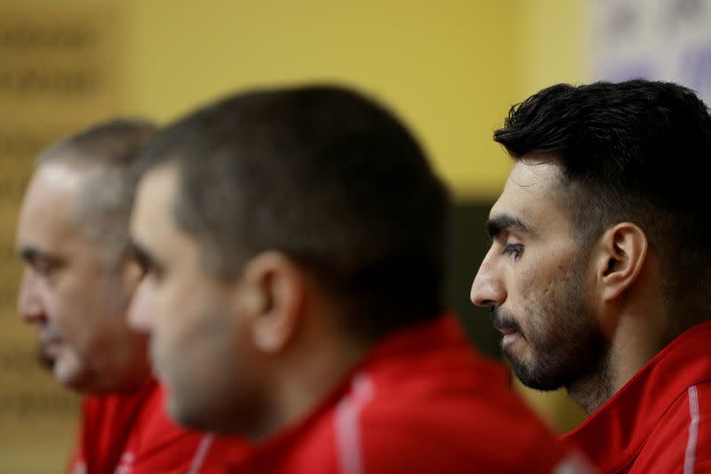 Iranian taekwondo competitor Farzad Zolghadri and the head of Bulgarian Taekwondo Federation Slavi Binev attend a news conference at Vasil Levski stadium in Sofia