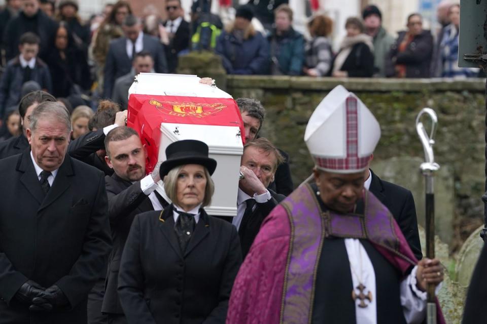 The coffin of William Brown is carried into St Mary And St Eanswythe Church, Folkestone (PA Wire)