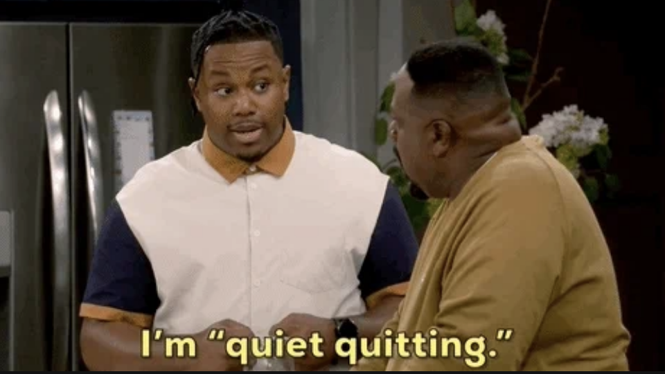 Two people stand in a kitchen. The text reads, "I'm 'quiet quitting.'"