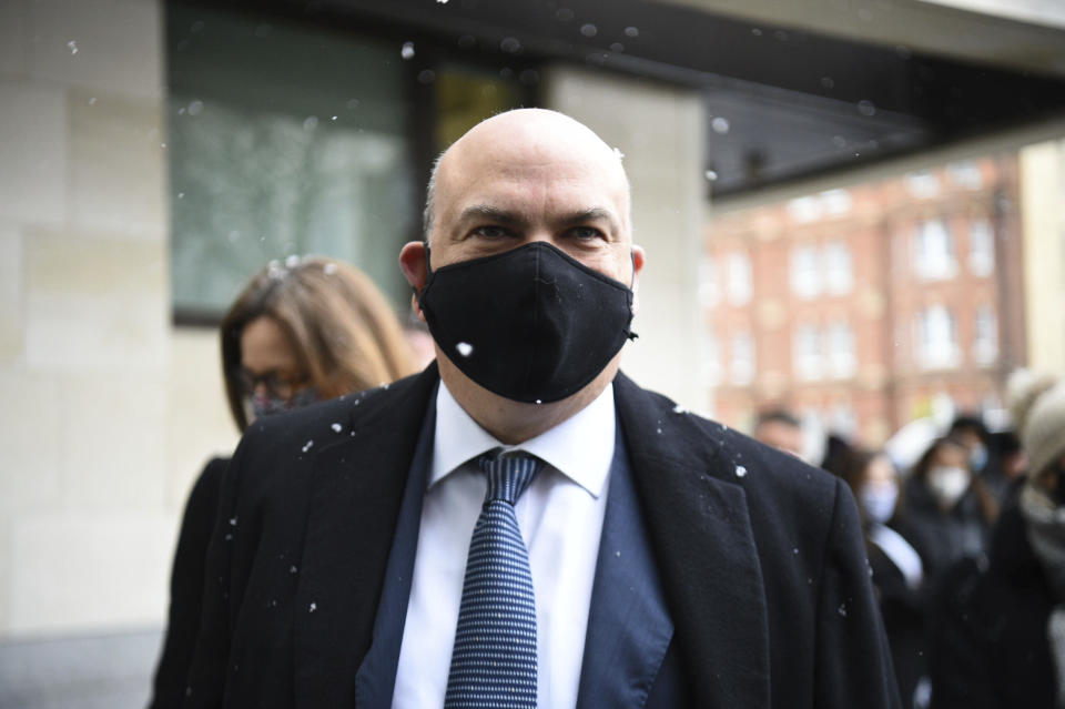 British tech tycoon Michael Lynch arrives at Westminster Magistrates' Court, London, Tuesday, Feb. 8, 2021. A British tech entrepreneur appeared in a London court Tuesday to fight extradition to the United States on fraud charges stemming from his firm’s takeover by Hewlett-Packard. U.S. prosecutors say Michael Lynch inflated the value of his software company, Autonomy, before it was bought by Hewlett-Packard for $11 billion in 2011. (Kirsty O'Connor/PA via AP)