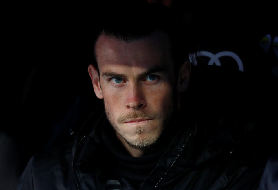 <p>Real Madrid’s Gareth Bale looks on from the bench </p>