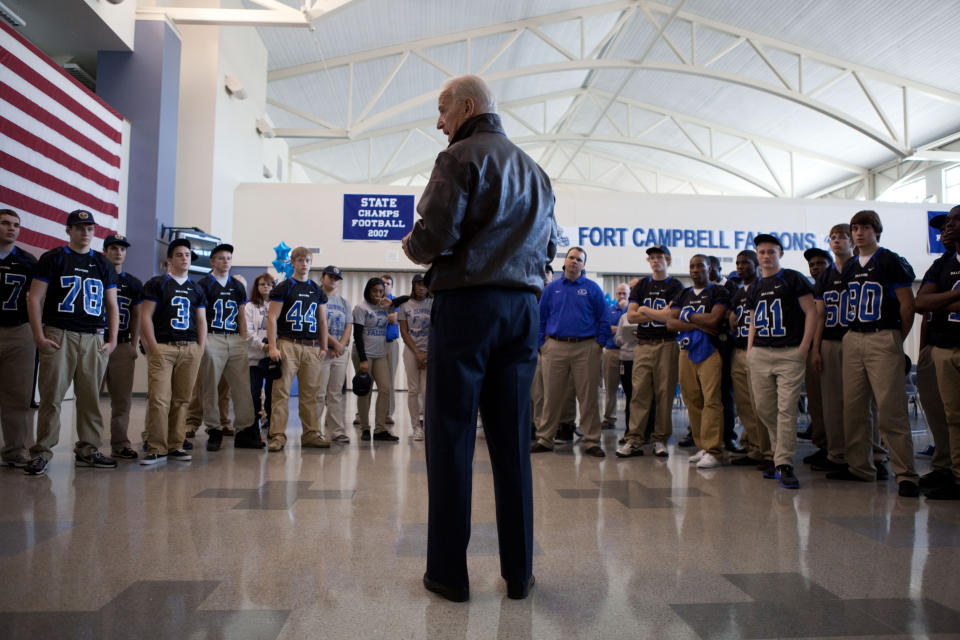 Vice President Joe Biden meets with members of the Fort Campbell Falcons high school football team during a visit to Fort Campbell, Ky., Feb. 11, 2011.  (Official White House Photo by David Lienemann)    This official White House photograph is being made available only for publication by news organizations and/or for personal use printing by the subject(s) of the photograph. The photograph may not be manipulated in any way and may not be used in commercial or political materials, advertisements, emails, products, promotions that in any way suggests approval or endorsement of the President, the First Family, or the White House.  