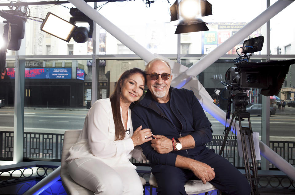 FILE - In this July 9, 2018 file photo, Gloria and Emilio Estefan pose for a portrait at BiteSize Studio in Los Angeles. The Estefans will receive the Library of Congress Gershwin Prize for Popular Song in May. They are the first married couple and musicians-songwriters of Hispanic descent to receive the honor. (Photo by Rebecca Cabage/Invision/AP, File)