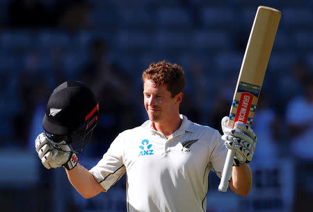 Cricket - Test Match - New Zealand v England - Eden Park, Auckland, New Zealand, March 25, 2018. New Zealand's Henry Nicholls celebrates after reaching his century during the fourth day of the first cricket test match. REUTERS/David Gray