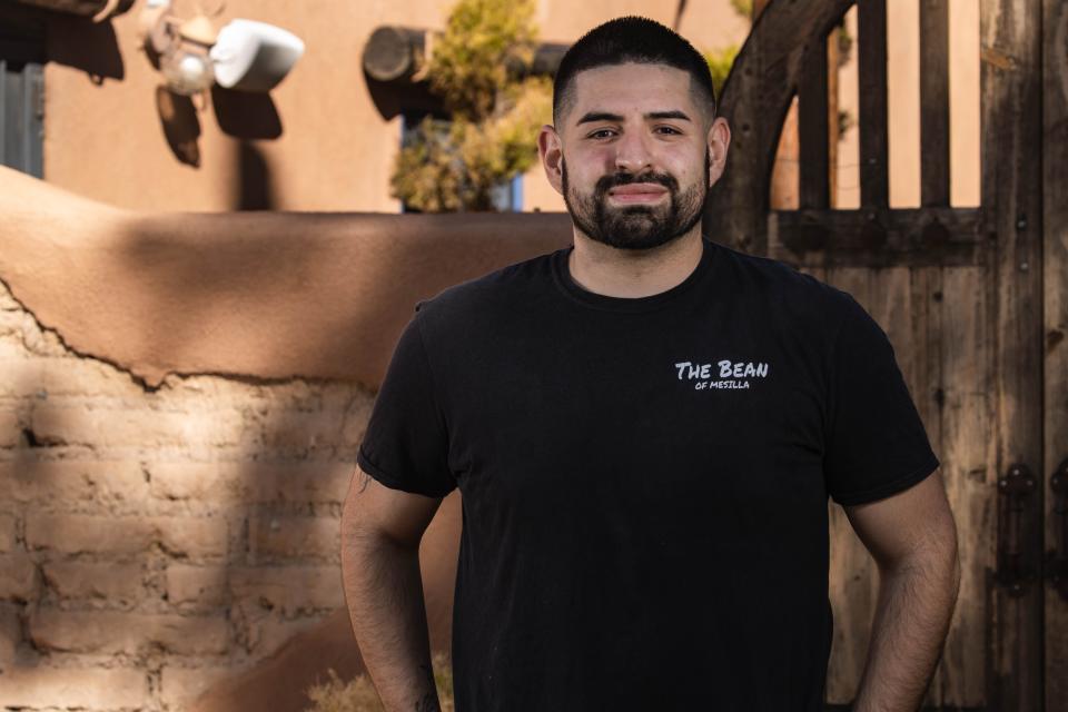 Mickey Balderas, owner of The Bean coffee shop, stands in the courtyard of the Bean at Josefina's — located at what used to be Josefina's Old Gate in Mesilla — on Thursday, Jan. 13, 2022. The first Bean location will remain open when the Bean at Josefina's opens in late January or early February.