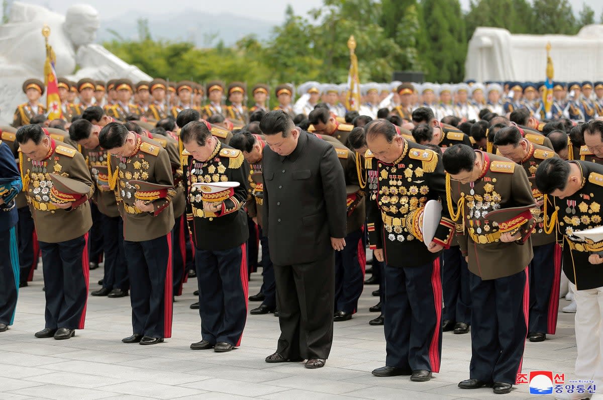 North Korea’s leader Kim Jong Un offers a silent prayer to pay tribute to the North’s soldiers killed in the Korean War (via REUTERS)