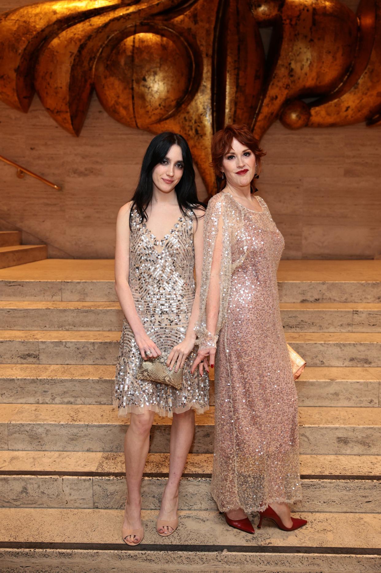 Molly Ringwald's 20-year-old daughter, Mathilda Gianopoulos (left), makes her acting debut in the Anne Hathaway-led romance "The Idea of You," which releases in May.