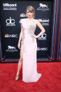 <p> This is a departure from Swift's normal sparkly red carpet choices—and I love it, frankly. According to Donatella Versace, this pretty pink and silver dress took 800 hours to create. It was the right moment for what the singer deemed "my first award show in a few years." </p>