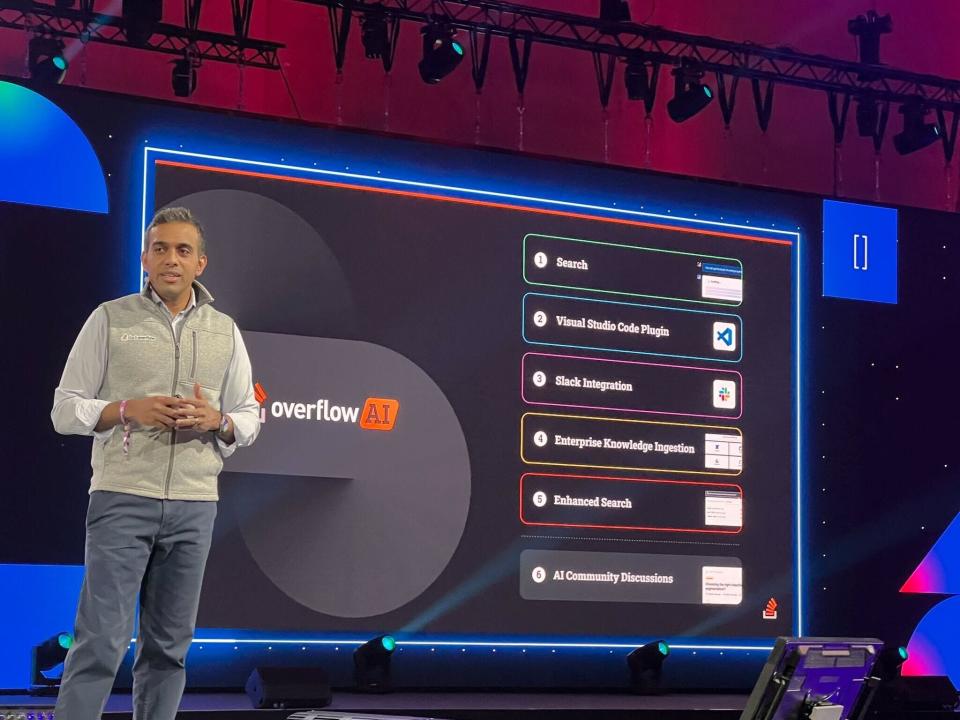 Stack Overflow CEO Prashanth Chandrasekar is shown on stage introducing a new product called Overflow AI