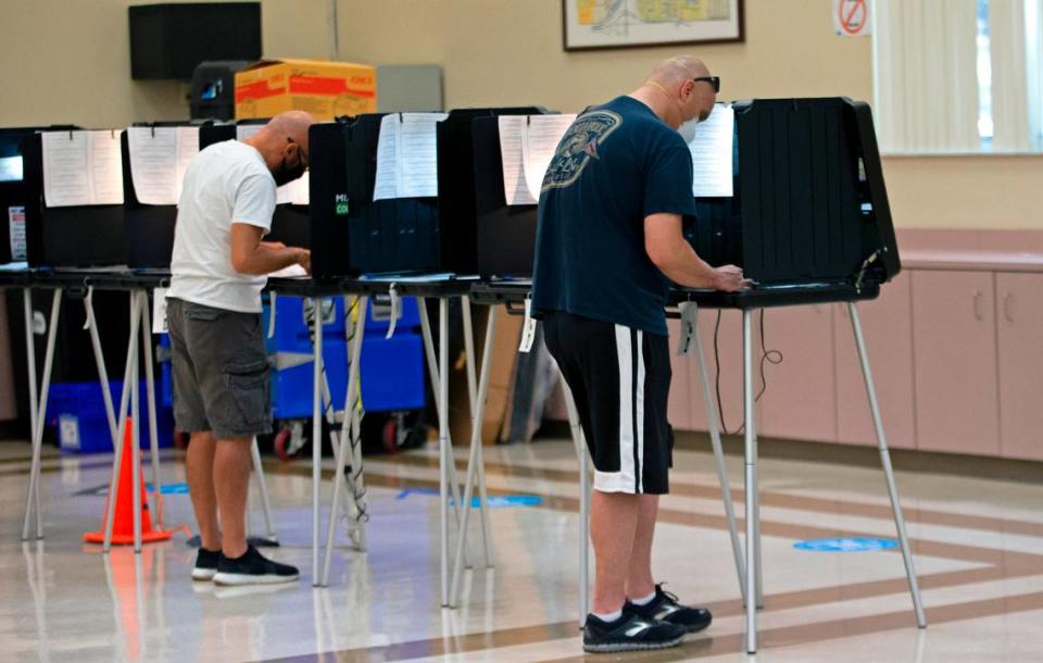 Voters fill out their ballots during early voting for the primary election at Miami Lakes Community Center at 15151 Montrose Rd. in Hialeah on Thursday, Aug. 13, 2020.