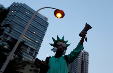 A protestor attends a protest in Central, Hong Kong