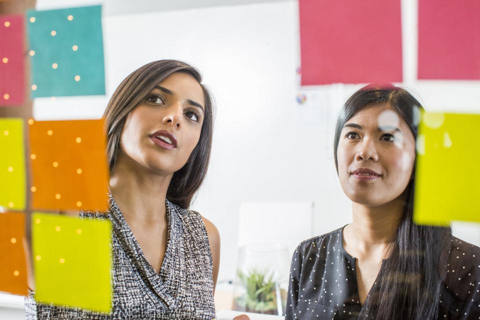 Woman and boss at work