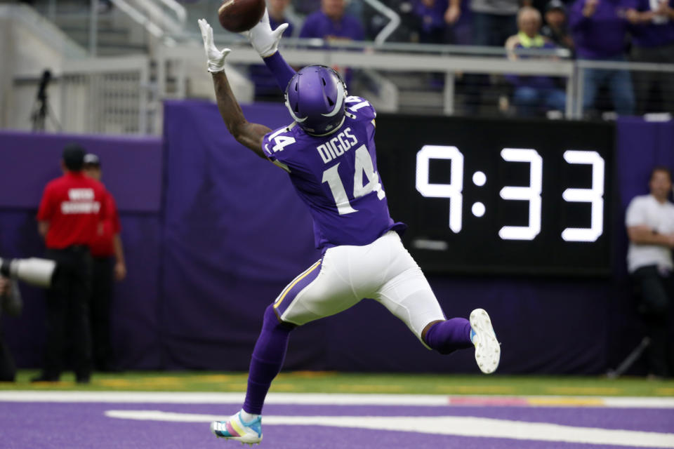 Minnesota Vikings wide receiver Stefon Diggs catches a 51-yard touchdown pass during the first half of an NFL football game against the Philadelphia Eagles, Sunday, Oct. 13, 2019, in Minneapolis. (AP Photo/Bruce Kluckhohn)