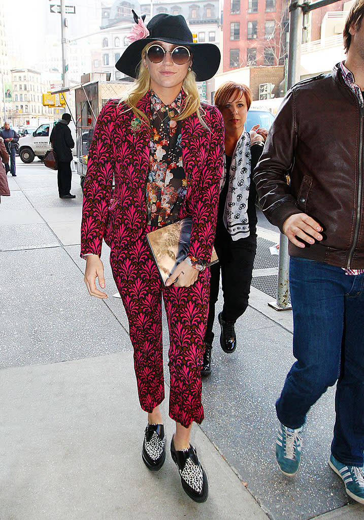 When Ke$ha hit the AMAs looking pretty and polished, we knew it couldn't last. Sure enough, two days later, the "Die Young" singer stopped by NYC's Z100 radio station looking like a hot mess in a hideous Miu Miu pantsuit. The clashing floral blouse she sported underneath it didn't do her any favors either. Maybe that's why she's wearing sunglasses and a floppy hat? We still see you, Ke$ha! (11/20/2012)