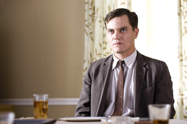 Michael Shannon looking displeased while sitting