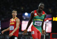 Grenada's Kirani James (R) reacts next to Belgium's Jonathan Borlee after winning the men's 400m final at the London 2012 Olympic Games at the Olympic Stadium August 6, 2012. REUTERS/Lucy Nicholson (BRITAIN - Tags: OLYMPICS SPORT ATHLETICS) 