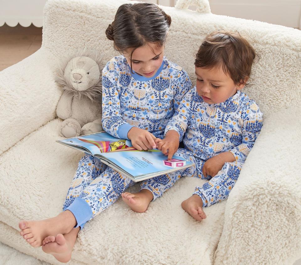 <p><a href="https://go.redirectingat.com?id=74968X1596630&url=https%3A%2F%2Fwww.potterybarnkids.com%2Fproducts%2Frifle-paper-co-hanukkah-nursery-pajama%2F&sref=https%3A%2F%2Fwww.womansday.com%2Flife%2Fg34347388%2Fhanukkah-gifts%2F" rel="nofollow noopener" target="_blank" data-ylk="slk:Shop Now;elm:context_link;itc:0;sec:content-canvas" class="link ">Shop Now</a></p><p>Rifle Paper Co. Hanukkah Organic Nursery Pajama</p><p>potterybarnkids.com</p><p>$39.00</p>