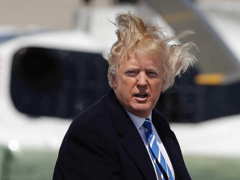 Then-President Donald Trump boards Air Force One. - Copyright: Evan Vucci/AP