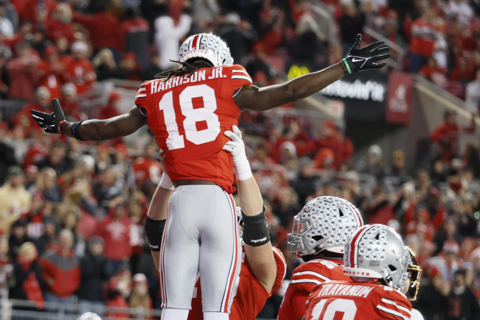 Ohio State receiver Marvin Harrison (18) will have a huge opportunity to move up in the Heisman race when he faces Michigan in a rivalry game with massive stakes. (AP Photo/Jay LaPrete)