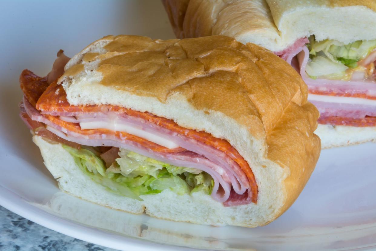 A side view of a slice of Italian grinder.