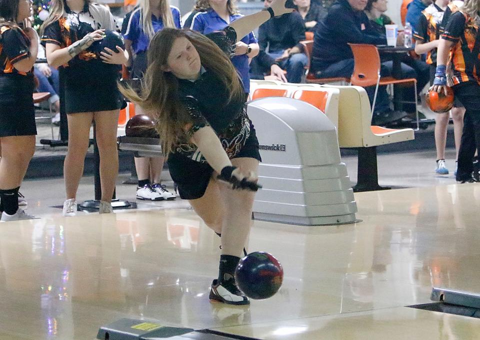 Ashland High School's Makayla Dreibelbis bowls against Wooster High School during their bowling match Tuesday, Nov. 30, 2021 at Luray Lanes. TOM E. PUSKAR/TIMES-GAZETTE.COM