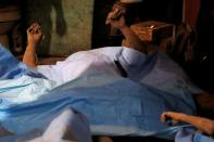 <p>The dead lay in the morgue in San Juan Alotenango. (Reuters) </p>