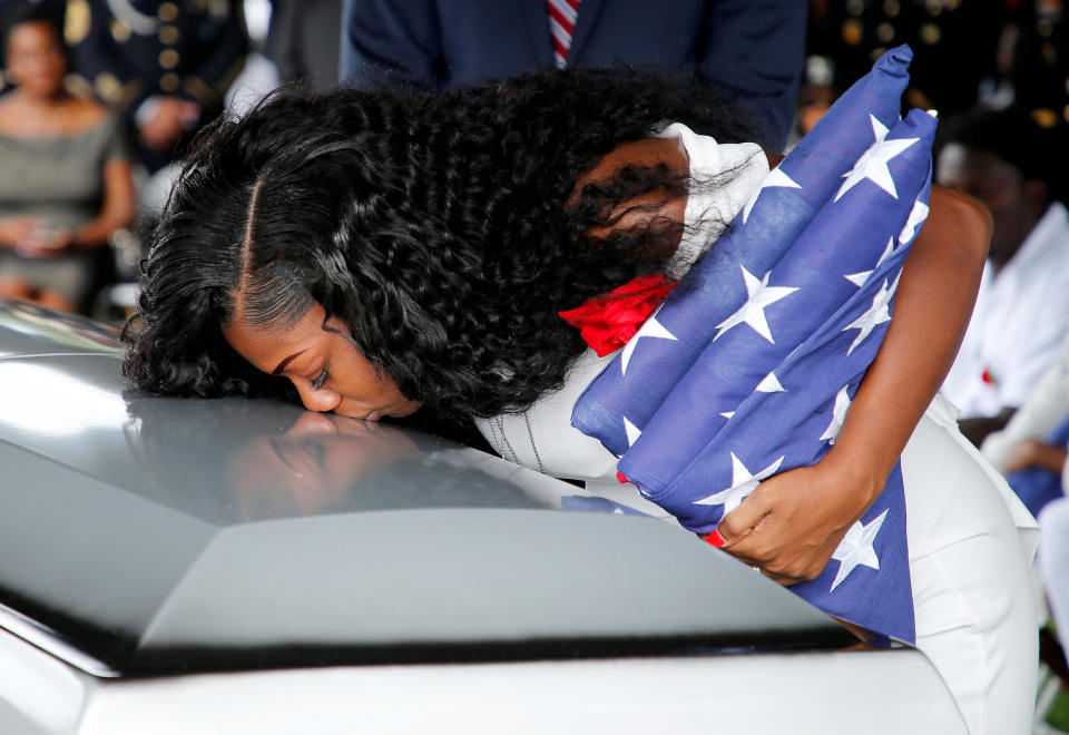 Myeshia Johnson, wife of U.S. Army Sgt. La David Johnson, kisses his coffin at a graveside service in Hollywood, Florida, on Oct. 21. (Photo: Joe Skipper / Reuters)