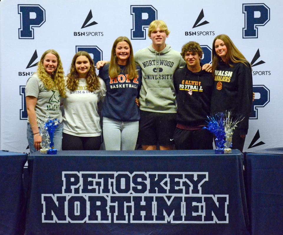 A total of six Petoskey High School athletes made things official with their college of choice Wednesday, which included (from left) Cassidy Whitener, Alyssa Glaser, Grayson Guy, Cade Trudeau, Tyler Dohm and Caroline Guy.