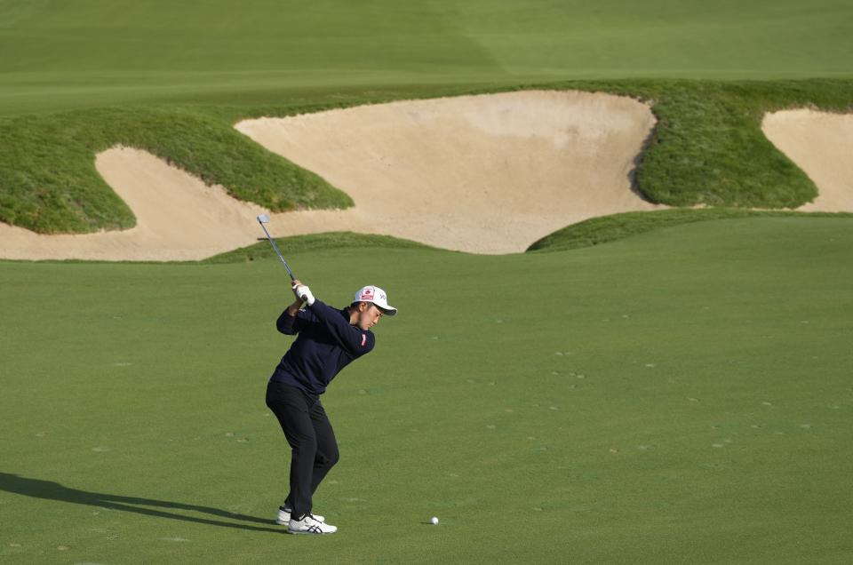 Takumi Kanaya of Japan plays a shot on the 16th hole during the second round of the Abu Dhabi Championship golf tournament at the Yas Links Golf Course, in Abu Dhabi, United Arab Emirates, Friday, Jan. 21, 2022. (AP Photo/Kamran Jebreili)