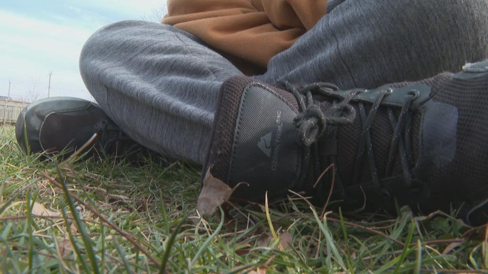 A close-up of the feet a Windsor teen who was robbed at knifepoint on a street at night on Feb. 11. The 15-year-old male robbery victim spoke with CBC News under condition that his face not be shown and his name not be published.