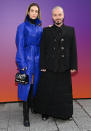 <p>Valentina Ferrer and J. Balvin are dripped in Louis Vuitton at the Louis Vuitton Fall Winter 2022/2023 show, as part of Paris Fashion Week, on Jan. 20.</p>