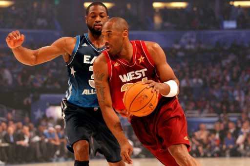 Kobe Bryant (R) of the Los Angeles Lakers and the Western Conference drives against Dwyane Wade of the Miami Heat and and the Eastern Conference during their 2012 NBA All-Star Game at the Amway Center on February 26, 2012 in Orlando, Florida. Bryant moved past Michael Jordan to become the leading NBA all-star game scorer but the Lakers superstar suffered a broken nose during the game