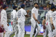 India's Ishant Sharma leaves the field for a tea break with other teammates during the second day of the second test cricket match between India and Bangladesh, in Kolkata, India, Saturday, Nov. 23, 2019. (AP Photo/Bikas Das)