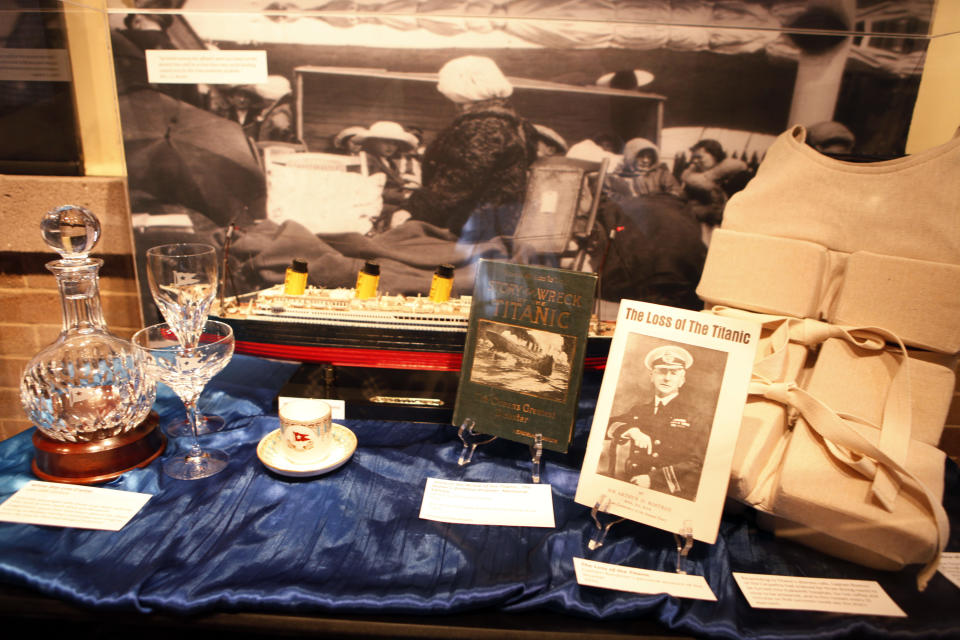 This March 19, 2012 photo shows a display of memorabilia at the Molly Brown House Museum in Denver. A few blocks from Colorado's state Capitol _ over 1700 miles from the Atlantic Ocean and a mile above sea level _ is a museum dedicated to a woman eclipsed by legend following the sinking of the Titantic. The "unsinkable Molly Brown" moved into this stone Victorian home after she and her husband struck it rich at a gold mine in Colorado's mountains, nearly 20 years before she boarded the Titanic because it was the first boat she could get back home to visit her ailing grandson. (AP Photo/Ed Andrieski)