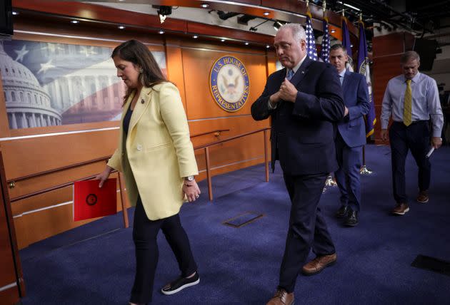 Rep. Elise Stefanik (R-N.Y.), left, and Rep Steve Scalise (R-La.), center, are seen after a press conference in June. Stefanik, the party conference chair, had been talked about as a candidate to succeed Scalise in the next higher slot of party whip, but she said Tuesday she will instead run to stay in her current leadership post. (Photo: Kevin Dietsch via Getty Images)