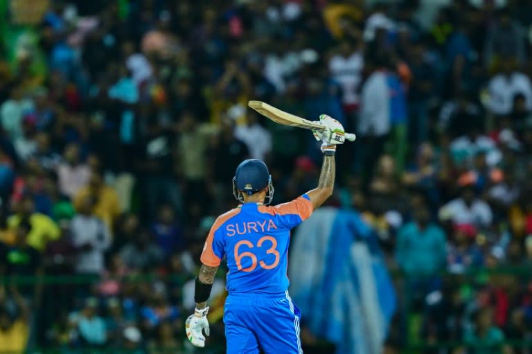 India's captain Suryakumar Yadav celebrates after scoring a half-century during the first T20I between Sri Lanka and India (Ishara S. KODIKARA)