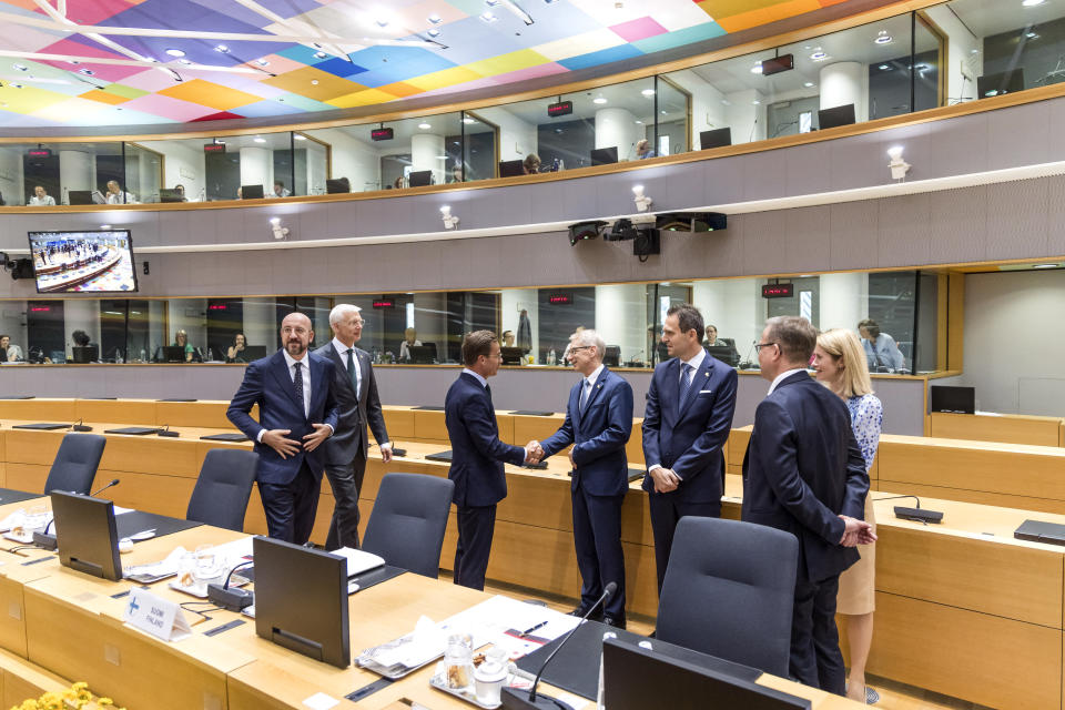 From left, European Council President Charles Michel, Latvia's Prime Minister Krisjanis Karins, Sweden's Prime Minister Ulf Kristersson, Bulgaria's Prime Minister Nikolai Denkov, Slovakia's Prime Minister Ludovit Odor, Finland's Prime Minister Petteri Orpo and Estonia's Prime Minister Kaja Kallas during a round table meeting at an EU summit in Brussels, Thursday, June 29, 2023. European leaders meet for a two-day summit to discuss Ukraine, migration and the economy. (AP Photo/Geert Vanden Wijngaert)