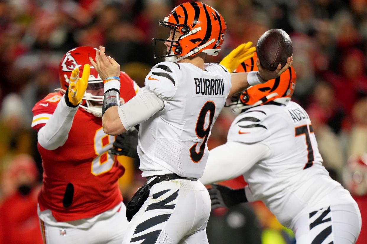 Cincinnati Bengals quarterback Joe Burrow under pressure from Kansas City Chiefs defensive end Carlos Dunlap