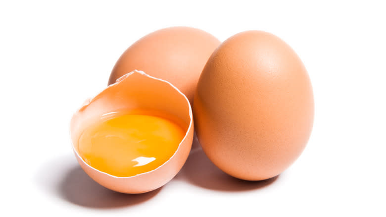 raw chicken eggs with yolk