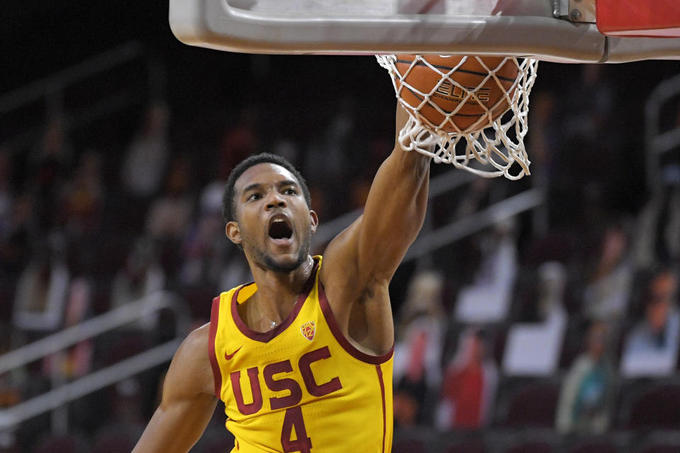 Southern California forward Evan Mobley dunks during the second half of the team's NCAA college basketball game against Arizona State on Wednesday, Feb. 17, 2021, in Los Angeles. USC won 89-71. (AP Photo/Mark J. Terrill)