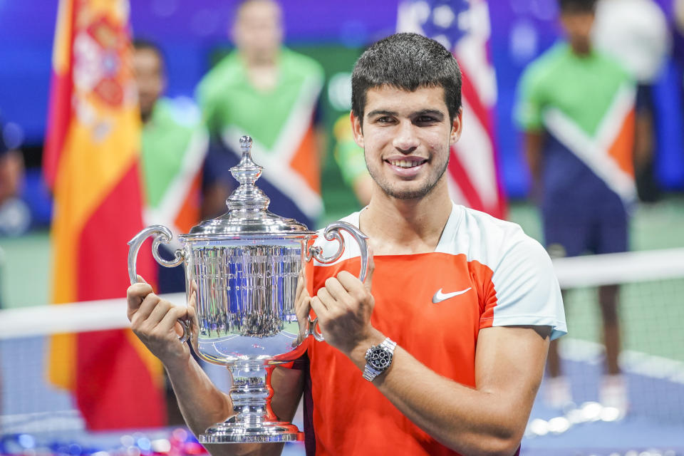 Seen here, Carlos Alcaraz holds the US Open trophy after winning his maiden grand slam title. 