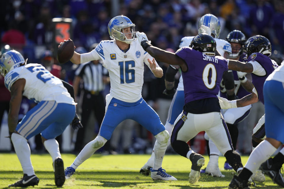 Detroit Lions quarterback Jared Goff (16) is pressured by Baltimore Ravens linebacker Roquan Smith (0) during the second half of an NFL football game, Sunday, Oct. 22, 2023, in Baltimore. (AP Photo/Alex Brandon)