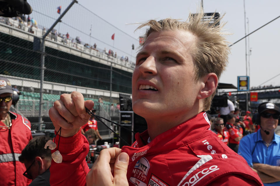 Marcus Ericsson, of Sweden, looks at the scoring pylon during practice for the Indianapolis 500 auto race at Indianapolis Motor Speedway, Thursday, May 18, 2023, in Indianapolis. (AP Photo/Darron Cummings)