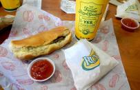 <p>A runza is essentially a long roll that’s been stuffed with meat, onions, sauerkraut or other fillings before being baked, and this Volga German-inspired sandwich is wildly popular in Nebraska. In fact, it’s one of the <a href="https://www.thedailymeal.com/entertain/united-states-food-official-state-foods-slideshow?referrer=yahoo&category=beauty_food&include_utm=1&utm_medium=referral&utm_source=yahoo&utm_campaign=feed" rel="nofollow noopener" target="_blank" data-ylk="slk:official state foods;elm:context_link;itc:0;sec:content-canvas" class="link ">official state foods</a>. The Cornhusker State is the home base of a chain of the same name that was founded in 1949. The original ground beef, onions and <a href="https://www.thedailymeal.com/cook/cabbage-uses-kinds-recipes?referrer=yahoo&category=beauty_food&include_utm=1&utm_medium=referral&utm_source=yahoo&utm_campaign=feed" rel="nofollow noopener" target="_blank" data-ylk="slk:cabbage;elm:context_link;itc:0;sec:content-canvas" class="link ">cabbage</a> variety is a traditional standby, but ordering yours with cheese added doesn’t hurt.</p>