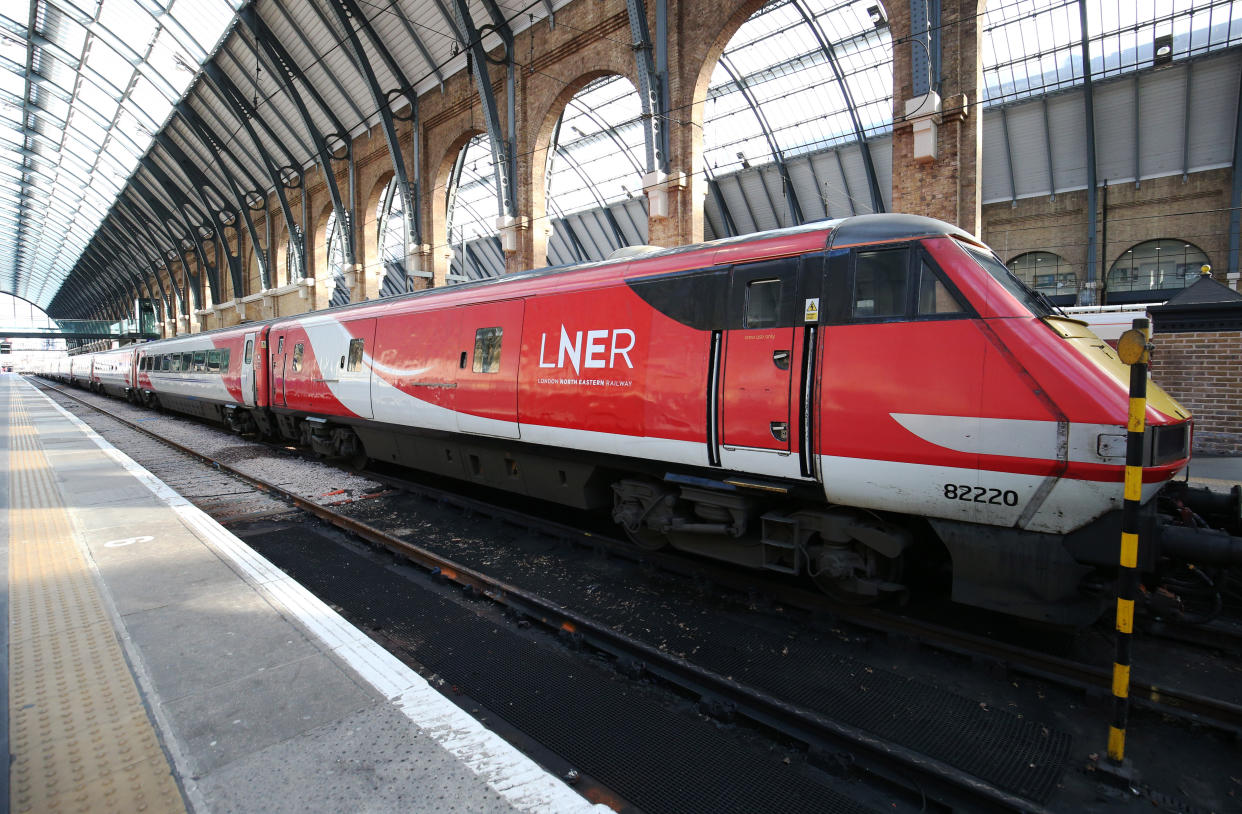 Rail passengers use a footbridge straddling platforms 6 and 5 at King's Cross railway station, London. PA Photo. Picture date: Friday March 6, 2020. Photo credit should read: Jonathan Brady/PA Wire (Photo by Jonathan Brady/PA Images via Getty Images)