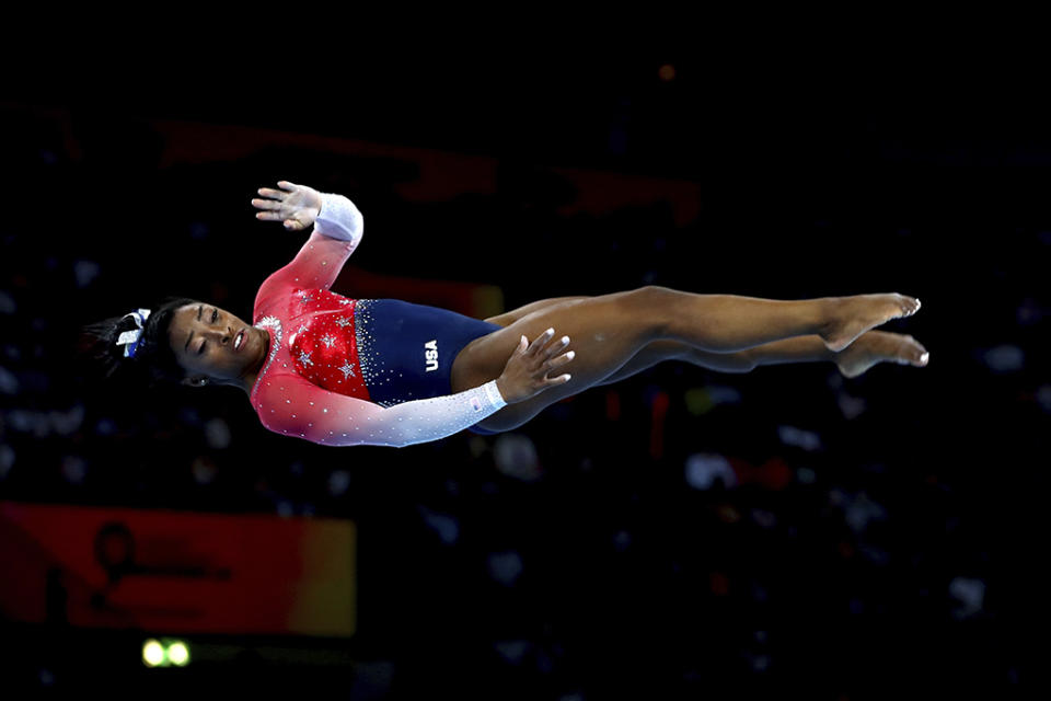 <p>Simone Biles performs on the floor during women’s team final at the Gymnastics World Championships in Stuttgart, Germany on Oct. 8, 2019.</p>