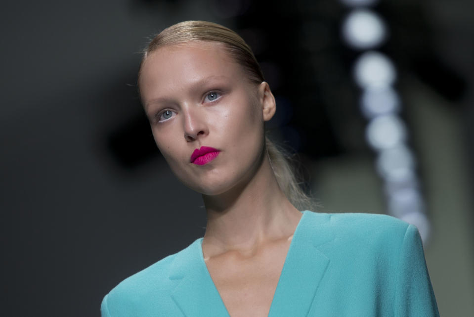 A model wears a Spring/Summer 2014 design by J. JS Lee during London Fashion Week at Somerset House, central London, Friday, Sept. 13, 2013. (Photo by Joel Ryan/Invision/AP)